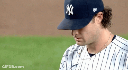 Man In NY Yankees Jersey On Baseball Field GIF