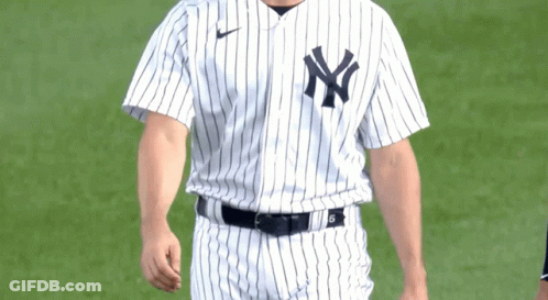 Man In NY Yankees Jersey On Baseball Field GIF