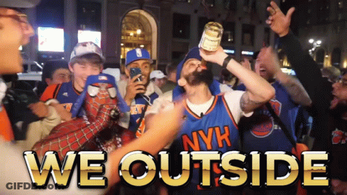 Man In NYK Jersey Holding Beer GIF