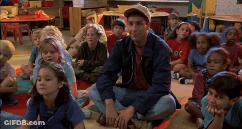Man In OC Jacket With Children Sitting GIF