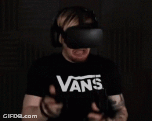 Man In Oculus Headset And Vans Shirt GIF