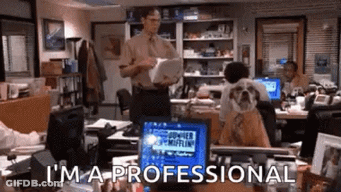 Man In Office Holding Paper GIF