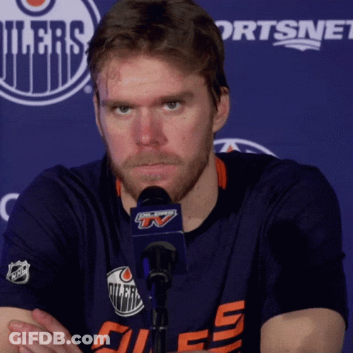Man In Oilers Jersey In Front Of Sportsnet GIF