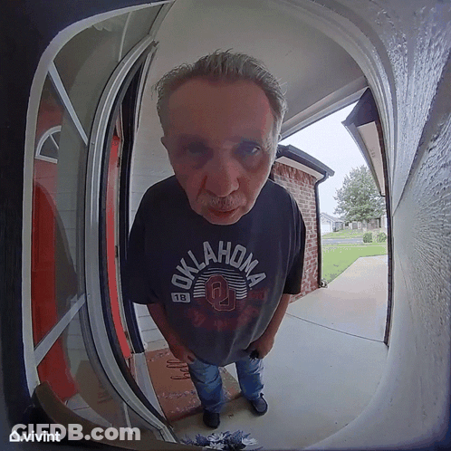 Man In Oklahoma Shirt Standing GIF