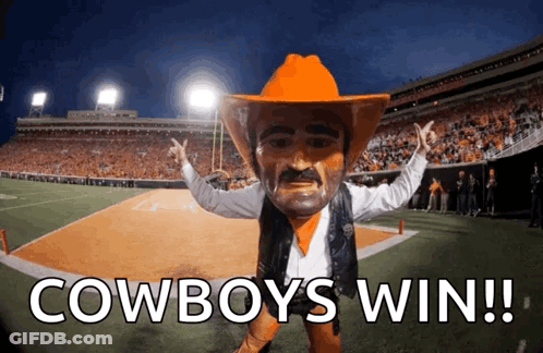 Man In Oklahoma State Jersey Covering Face GIF