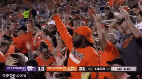 Man In Oklahoma State Shirt In Crowd GIF