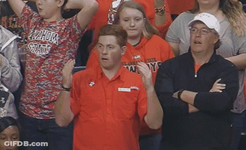 Man In Oklahoma State Shirt In Crowd GIF