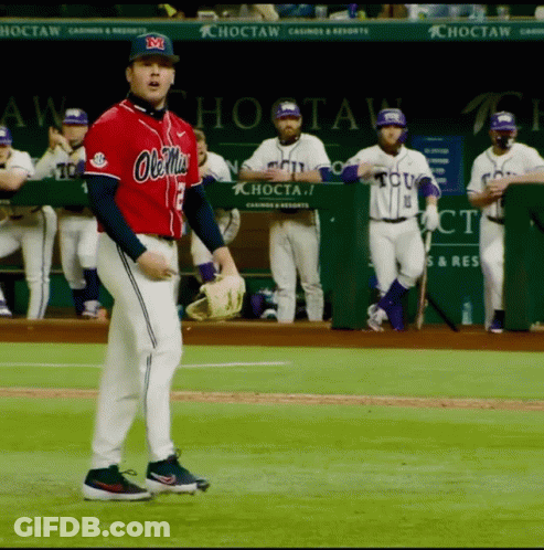 Man In Ole Miss Jersey On Field GIF