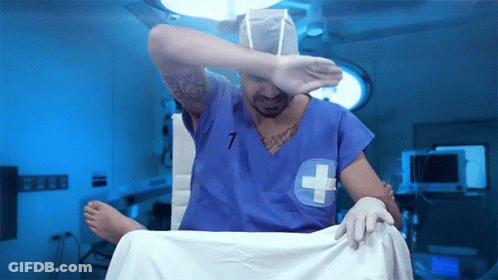 Man In Operating Room With Number 7 GIF