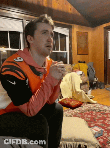 Man In Orange And Black Jersey Number 9 GIF