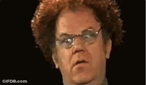 Man In Orange And Blue Sweater Making Funny Face GIF