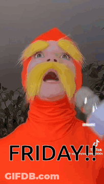 Man In Orange Costume With Yellow Mustache Holding Microphone Saying Friday GIF