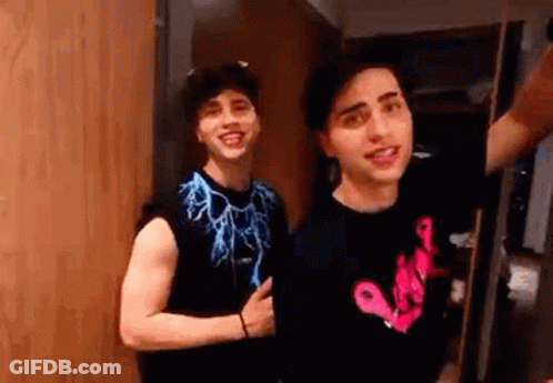 Man In Orange Football Jersey Number 8 Looking GIF