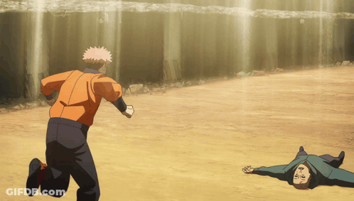 Man In Orange Jacket Running Toward Man On Ground GIF