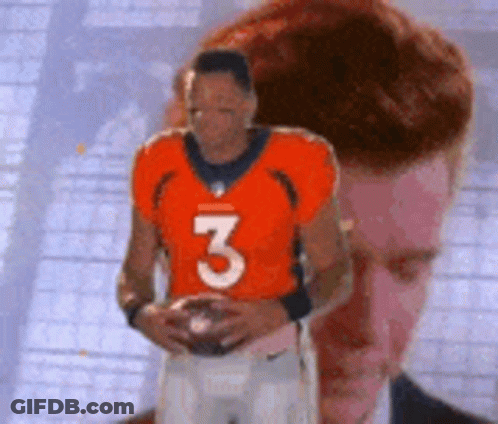 Man In Orange Jersey Number 3 Holding Football GIF