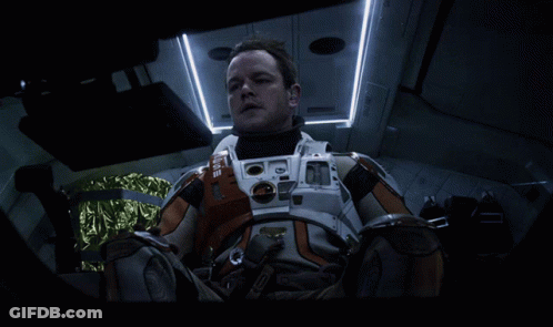 Man In Orange NASA Space Suit GIF
