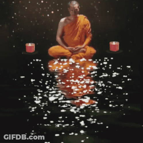 Man In Orange Robe Sitting Lotus GIF