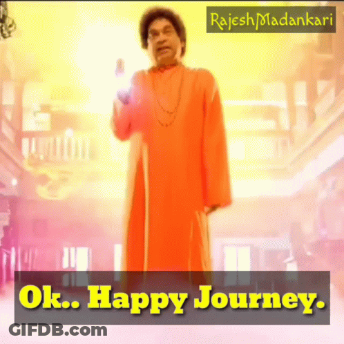 Man In Orange Robe With Ok Happy Journey Sign GIF