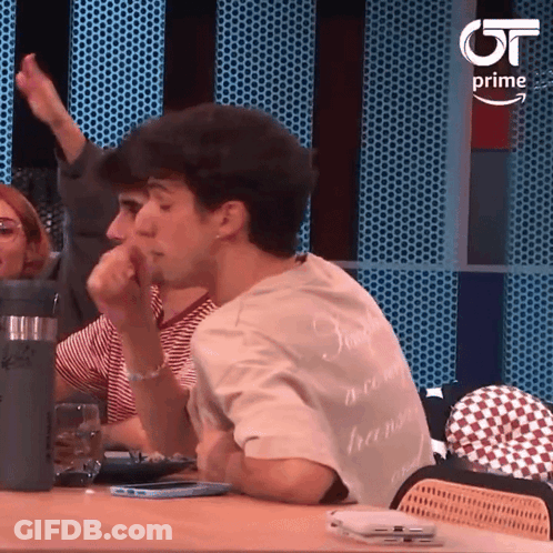 Man In Orange Shirt Dancing GIF
