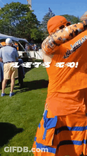 Man In Orange Shirt Saying Old House GIF