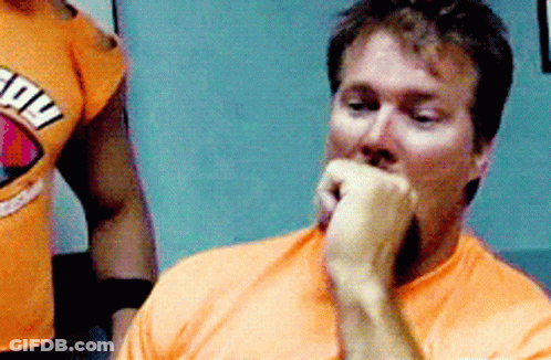 Man In Orange Shirt Saying Power GIF