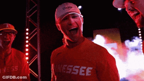Man In Orange Shirt Saying Tennessee Laughing GIF