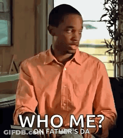 Man In Orange Shirt Saying Who Me GIF
