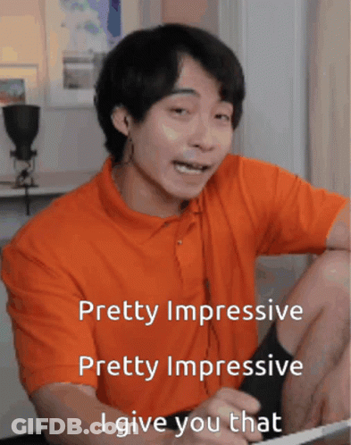 Man In Orange Shirt Says Pretty Impressive I Give You That GIF