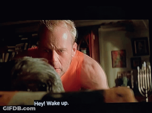 Man In Orange Shirt Talking GIF