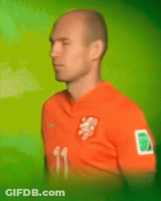 Man In Orange Shirt With Lion GIF