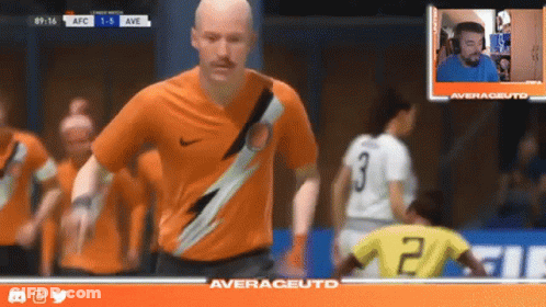 Man In Orange Shirt With Number 2 GIF