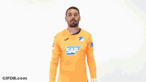 Man In Orange Shirt With Sap GIF