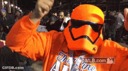 Man In Orange Stormtrooper Costume GIF