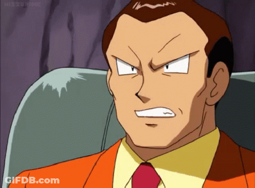 Man In Orange Suit And Red Tie Sitting Angry GIF