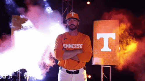 Man In Orange Tennessee Jersey With Arms Crossed GIF