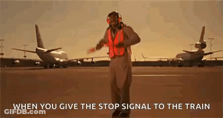 Man In Orange Vest Stop Signal Airport GIF