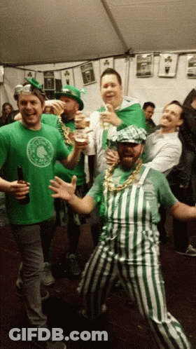 Man In Overalls And Green Shirt Saying Irish GIF