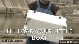 Man In Overalls Holding Cooler Says I'll Load Your Little Boat GIF