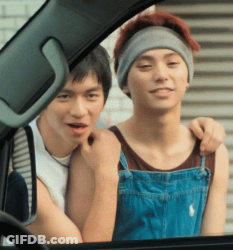 Man In Overalls Hugging Another Man GIF