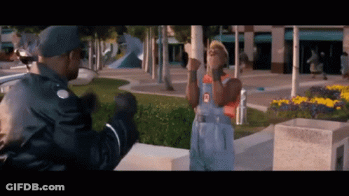 Man In Overalls With Letter O GIF