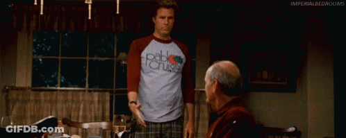 Man In Pablo Cruise Shirt Next To Older Man GIF