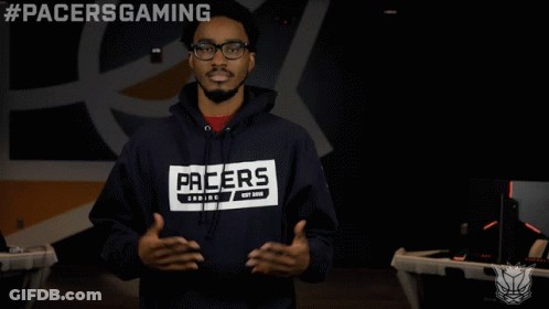 Man In Pacers Hoodie Holding Hands Out GIF