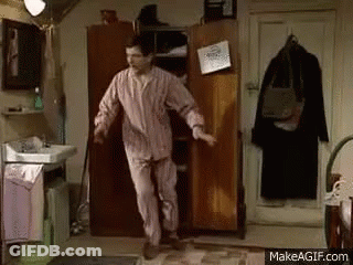 Man In Pajamas Dancing In Front Of Wardrobe GIF