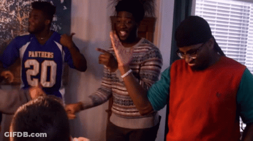 Man In Panthers Jersey Dancing With Two Men GIF
