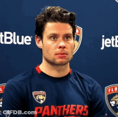 Man In Panthers Jersey Looking To The Side GIF