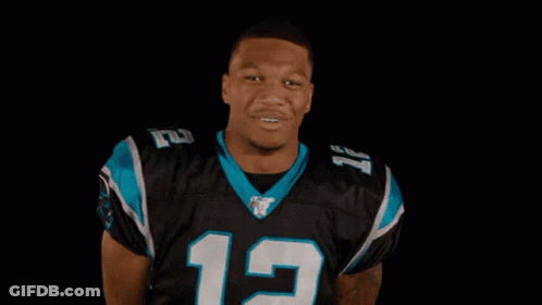 Man In Panthers Jersey Smiling And Clapping GIF