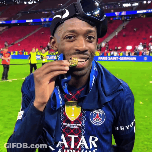 Man In Paris Saint-Germain Jersey Holding Medal GIF