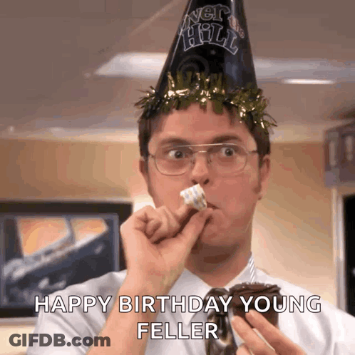 Man In Party Hat Eating Cake GIF