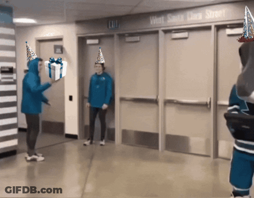 Man In Party Hat Holding Gift At Exit Door GIF