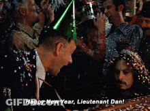 Man In Party Hat Says Happy New Year Lieutenant Dan GIF